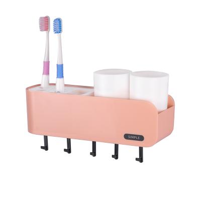 China Viable Organizer Family Bathroom Storage Set 2 Cups Wall Mount Plastic Toothbrush Holder With Towel Hook for sale