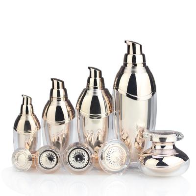 China New Products Cosmetic Gold YOYO Ball Cosmetics Containers Plastic Cream Jar Luxury Acrylic Cosmetic Lotion Bottles Packaging for sale