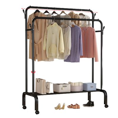 China Minimalist Movable Clothes Rack Floor Bedroom Clothes Folding Hanger Rack Balcony Indoor Single Clothes Drying Rack for sale