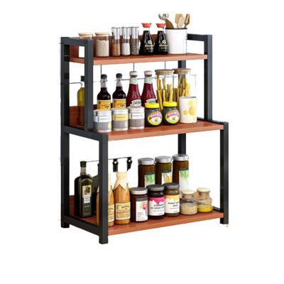 China Black Minimalist Steel Countertop Seasoning Rack Kitchen Soy Sauce Bottle Storage Rack Multi-Layer Shelf for Seasoning for sale