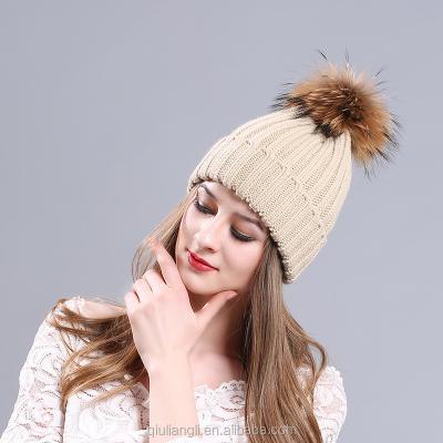 China COMMON wholesale knitted beanie hats with real raccoon fur pom pom balls for sale