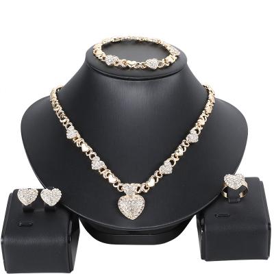 China Dubai CLASSIC XXOO African Gold Bridal Jewelry Sets For Women Bracelet Earrings Wedding Necklace Crystal Heart Shaped Sets for sale