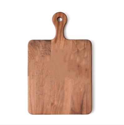 China Sustainable Walnut Cutting Board Suitable for Kitchen with Handle Tray Bread Pizza Cookie Tray Meat Cutting Board for sale