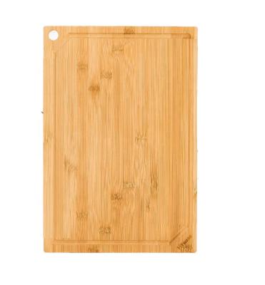 China Large Super Sustainable Bamboo Cutting Board Heavy Wooden Cutting Board With Juice Reservoir 100% Organic Bamboo Pre-Oil for sale