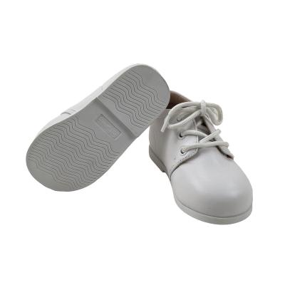 China Flat 2022 Newborn Pre-walking Kids Black White Leather Lace-Up Classic Baby Sports Shoes Small School Shoes for sale