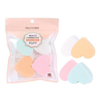 China Hot Selling Eco-friendly Elastic Facial Cleansing Cellulose Sponge Heart Shaped Cosmetic Powder Puff for sale