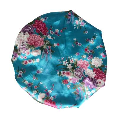 China Beautiful Silky Wide Band Single Satin Flower Sleeping Hat Silky Hood for sale