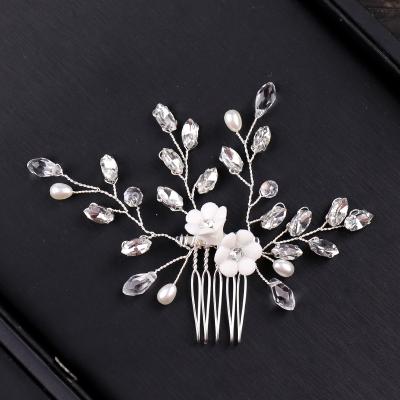 China Hot Fashion Alloy/Hair Comb Ceramic Flower Sales Rhinestone/Crystal/Pearl Wedding Hair Combs for sale