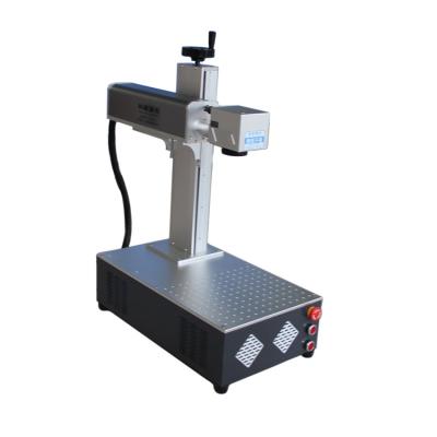 China Laser Engraving Fiber Laser Marking Machine Qr Code Mini Laser Engraving Machine Portable Laser Marker Machine 20W 30W 50W for sale