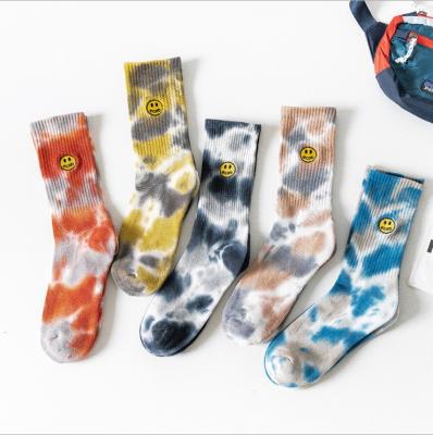 China QUICK DRY dye tying embroidery faces socks men's street trend cotton socks student sports smile socks for sale