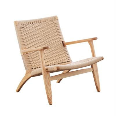 China Nordic Minimalist Handwoven Log Lounger Solid Wood Rattan Rattan Lounger Balcony Bachelor Sofa Solid Wood Chair for sale