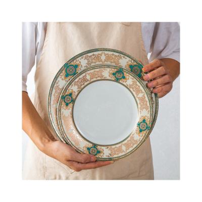 China Perfect Sustainable Quality Hotel Plates Ceramic Dinner Plates White Ceramic Dinner Plates Sets With Gold Rim for sale