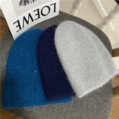 China Thick warm hair knitted hat pile hat pile cold hat COMMON western woolen angoras style rabbit hair hearing protection rabbit for sale