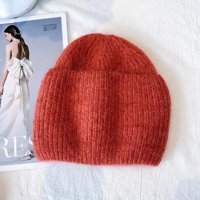 China COMMON Wholesale Korean Thick Warm Hat Rabbit Hair Japanese Angora Women Autumn And Winter Solid Color Lovely Knitted Hats for sale