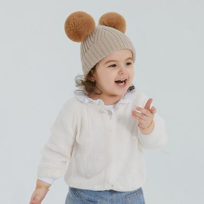 China Comfortable Autumn And Winter Skin Corniness Fur Ball Winter Baby Monochrome Warm Hat Double Knitted Hat Kids Hats Caps for sale