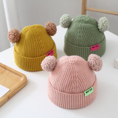 China Character Sale Solid Color Wool Baby Hat Autumn And Winter Knitted Bulb Hat Hearing Protection Thick Warm Children Hats for sale