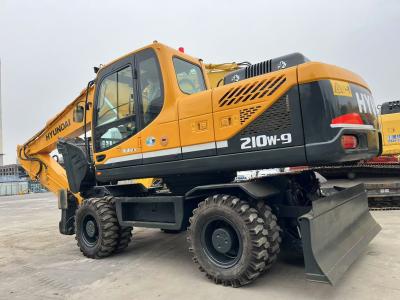 China Movendo Tipo Usado Hyundai R210W-9 Excavadora de rodas 21 toneladas Usada Hyundai Excavadora de rodas à venda