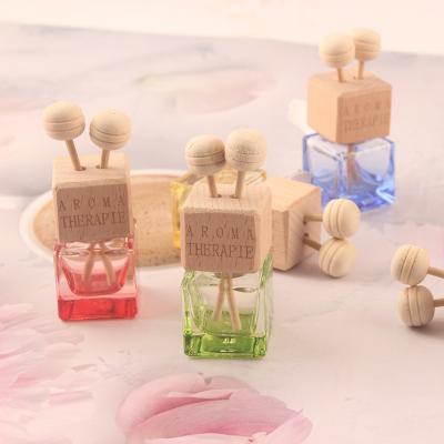 China Glass Fragrance Perfume Bottle Ornament Essential Oil Diffuser Perfume Hanging Empty Bottle Inner Accessory for sale