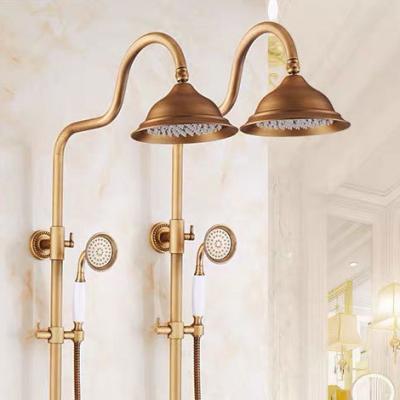 China Metered Faucets Copper All European Retro Shower Faucet Set Antique Bronze Hot And Cold Water Faucet Rainfall Shower Head for sale