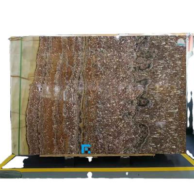 China Modern red marble slab onyx background book onyx dragon onice transparent wall cladding designs custom thickness book match onyx for sale