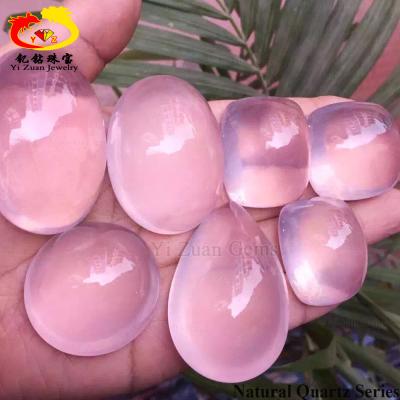 China Color play or fire customized shape natural rough pink crystal rose translucent loose cabochon quartz stone for sale