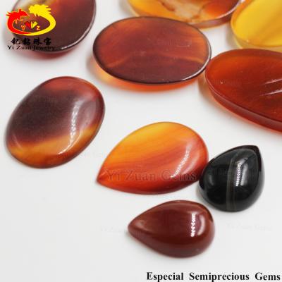 China Semi-precious stone colored dyed gemstone carnelian of rough color game or fire agate prices for sale