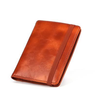 China Custom Vintage Cheap Price RFID PU Leather Passport Holder with Card Slots, SIM Card Holders, Travel Accessories for Women Men for sale