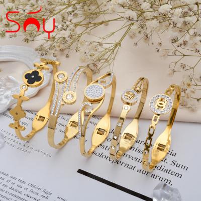 China FASHIONABLE Punk Gold Plated Cone Rivets Shape Bracelets Brand Stainless Steel Jewelry Bangle Set for sale