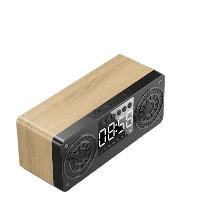 China 2021 new function speaker wooden clock alarm clock U disk insert TF card radio wireless multimedia audio gift customization for sale