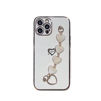 China Anti-fall side love plush electroplating wristband fits for iphone12 Apple 11 right edge hole thin silicone mobile phone case for sale