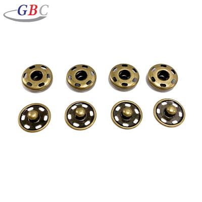 China Custom Hot Selling Dry Cleaning Metal Brass 4 Holes Sew Button For Clothes for sale