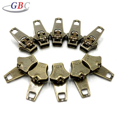 China Other Qualified Main 4# Metal Spring Zipper Slider For Clothes for sale