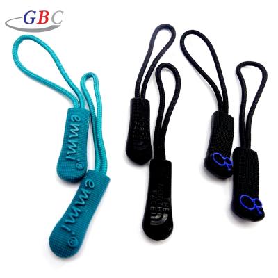 China Backpack Custom Design PVC / TPU Zipper Puller Polyester String for sale