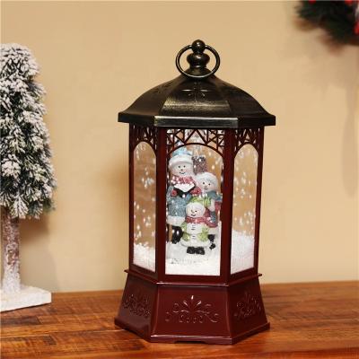 China Table Lamp Plastic Musical Portable Lamp With Lighted Snowfall Lantern With Light And Music for sale