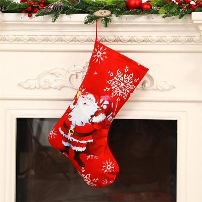 China New Arrival Christmas Nonwoven Plush Stocking Xmas Gift Bags Santa Stocking Boots Snowman Gift Stocking for sale