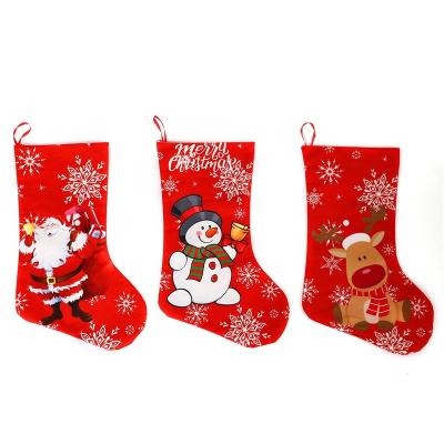 China Beautiful Non-woven Christmas Ornaments Stockings Christmas Socks Decoration Snowman Gift Stocking for sale