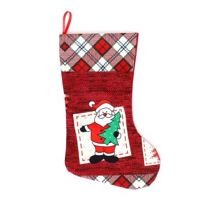 China Non-Woven Non-Woven Santa Gift Stocking Christmas Stocking Socks With Santa Snowman Reindeer Candy Stocking Bag for sale