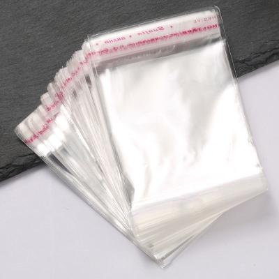 China Security Shop Mini Small Plastic Bag Self Adhesive Transparent Seal OPP Accessories Jewelry Package Sticker Bag for sale