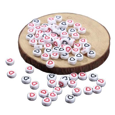 China For Crafts Wholesale 1000pcs 4x7mm Acrylic Round Beads With Heart On For Diy Jewelry Making for sale