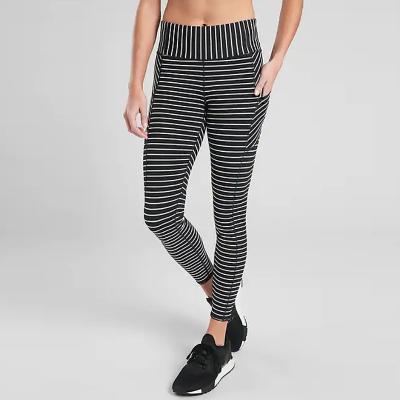 China European and American popular thin female spot manufacturers breathable yoga pocket stripe leggings direct sales for sale