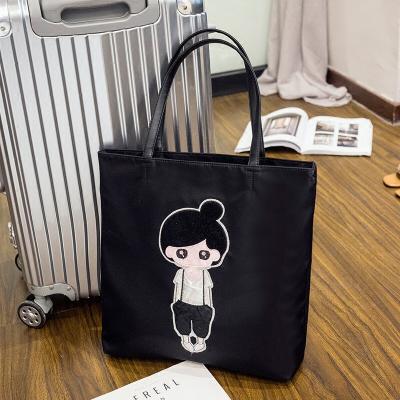 China Oxford Cloth Shoulder Bag Waterproof Nylon Handbag 2021 New Student Shopping Bag Embroidered Portable Tote Bag for sale