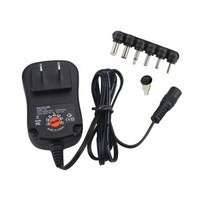 China LAPTOP EU/US/AU/UK Plug In 12W Universal Adapter AC/DC Switching Power Supply With 6 Selectable Adapter Tips for sale