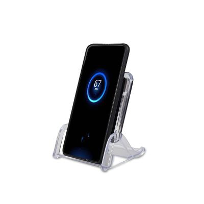 China Universal Phone Stand Pad 10w Mobile Phone Desktop Qi Wireless Charging Fast Wireless Stand for sale