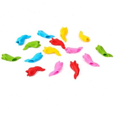 China Excellent Quality Safety Grip Posture Correct Fish Shaped Soft Custom Pencil Grip for sale