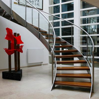 China Modern staircase ideas with glass balustrade and wood tread interior curved stairs for sale