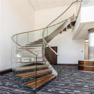 China Modern glass balustrade and wood tread interior curved stairs for sale