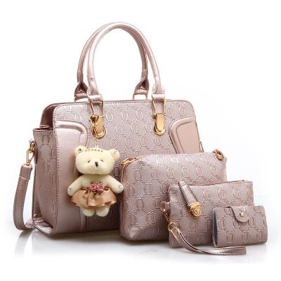 China Water Resistant Women's Large Tote Handbag Set Large Shoulder Bag Purses And Handbags With Bear Pendant for sale