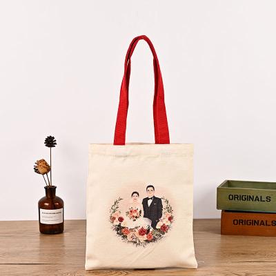 China Manufacturers Handled Custom Printed LOGO Cotton Gift Bag Wedding Canvas Gift Bag Wedding Keepsake Bag for sale