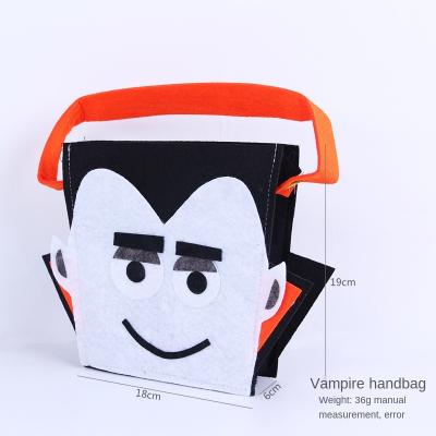 China Popular Wholesale Felt Wrap Cloth Candy Ghost Halloween Carnival Ghost Pumpkin Halloween Cloth Bag for sale