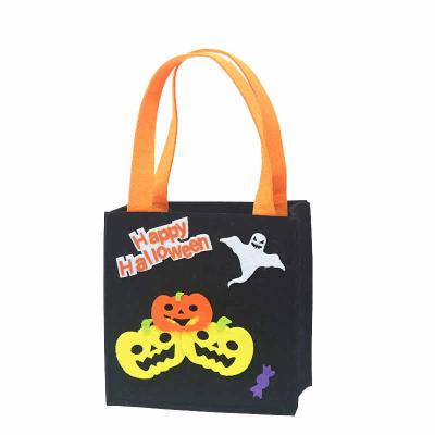 China Portable Popular Christmas Supplies Seamless Cloth Ghost Festival Candy Gift Witch Pumpkin Christmas Halloween Decoration Bag for sale